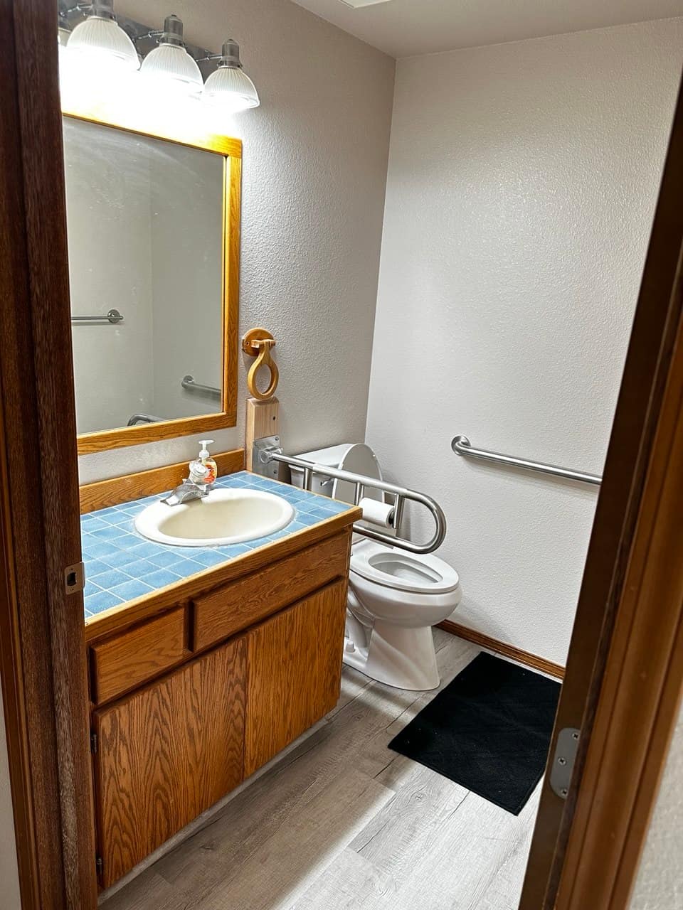 Bathroom with Toilet Safety Rails — HopeSprings Adult Family Home Vancouver WA